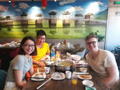 Zander enjoying food with Angelina from the LTL Beijing Team